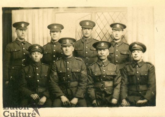 Group photograph of eight soldiers including Ronald Rootham Group photograph of eight soldiers including Ronald Rootham
